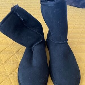 Brand new women UGG boots size 7.